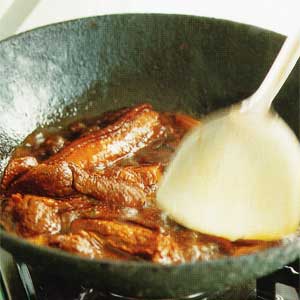 Braising using a wok